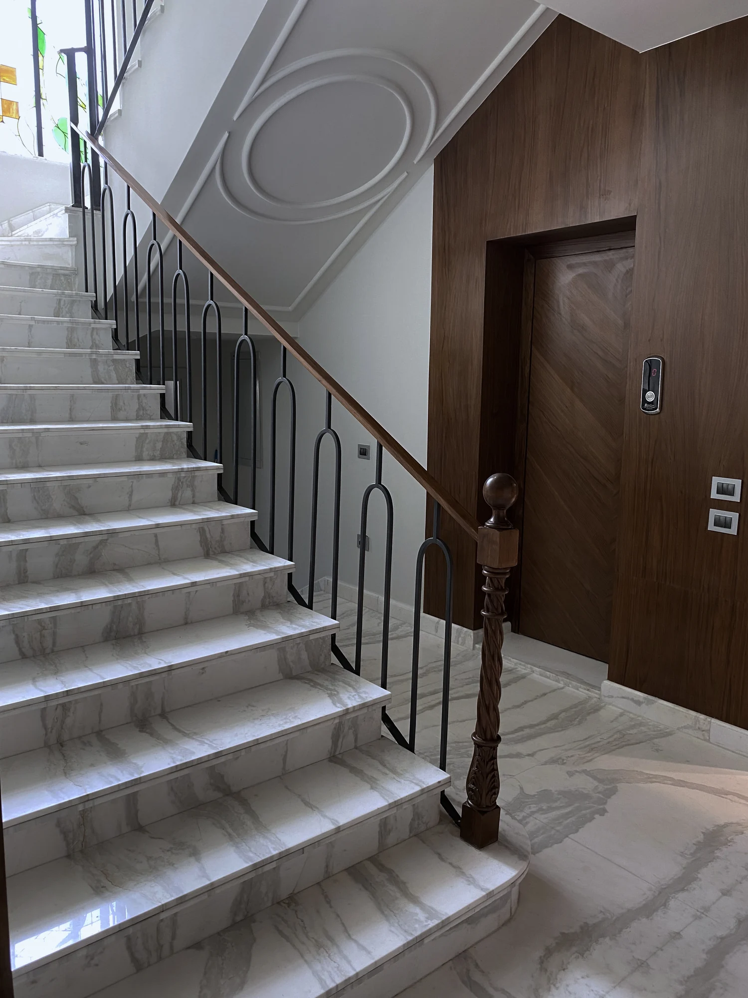 Marble staircase and interior detailing at Dyar Compound